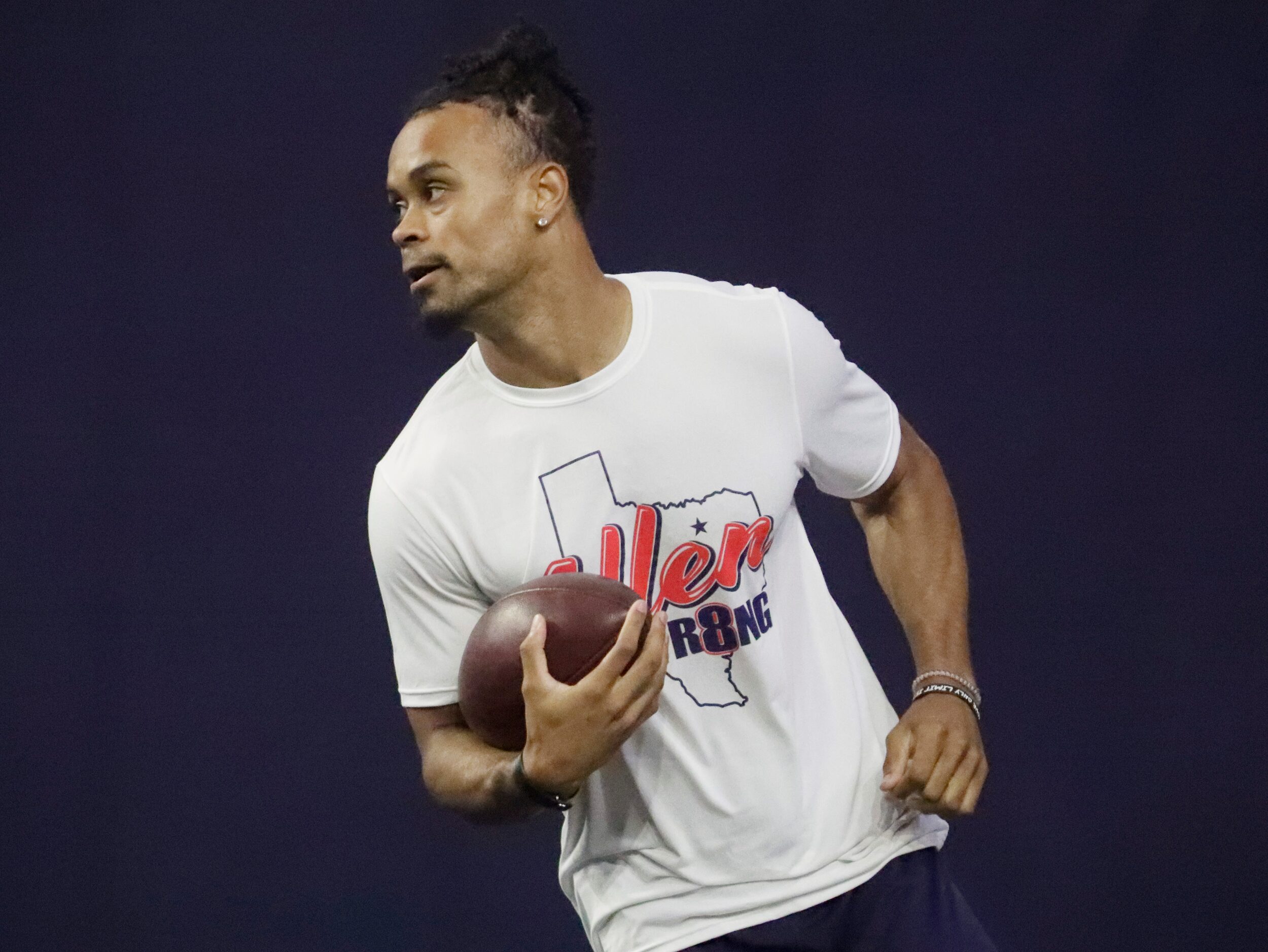 Wide receiver Jalen Tolbert runs after a catch as the Dallas Cowboys held mini camp at the...