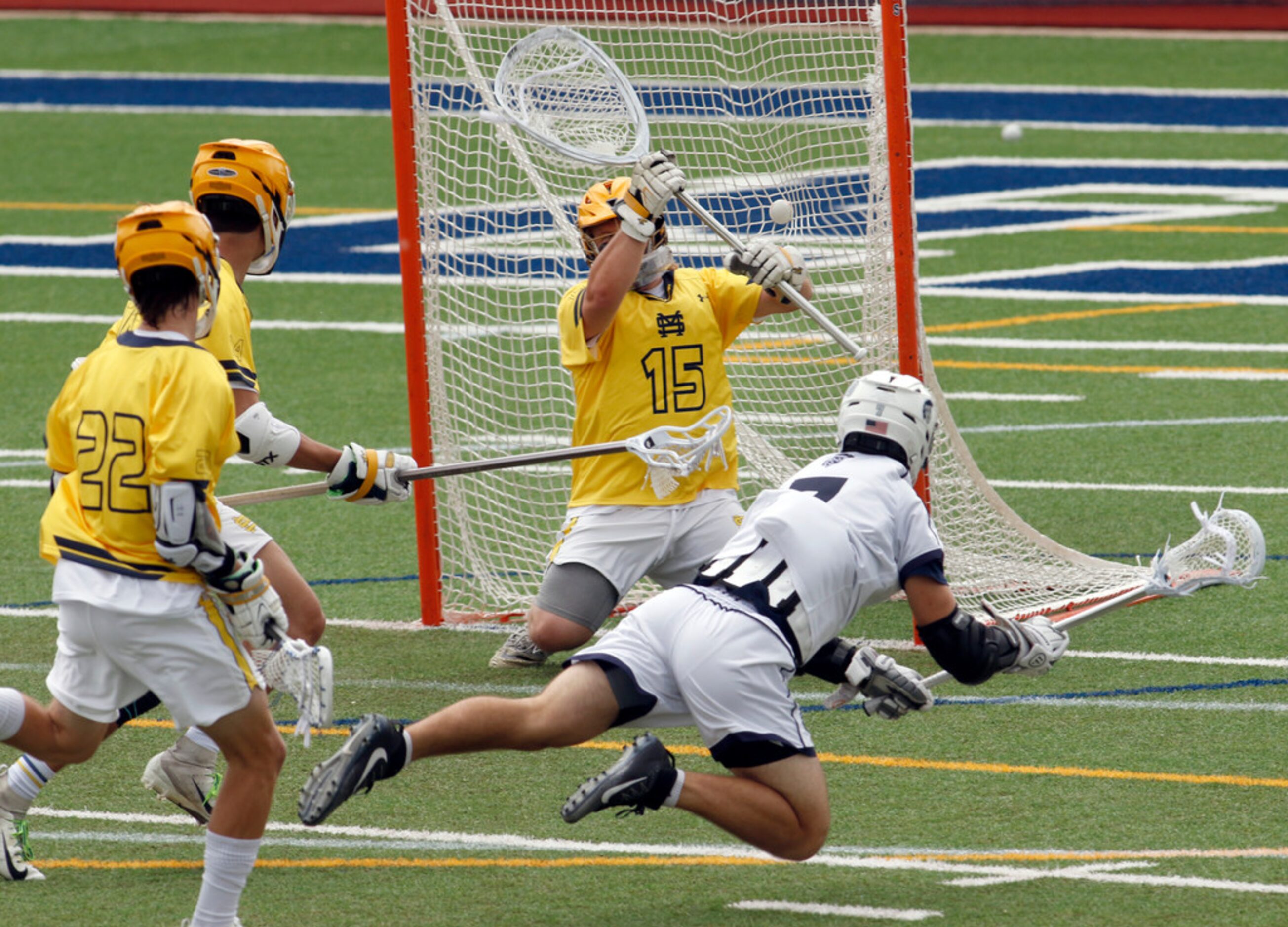 Episcopal School of Dallas midfielder Jack Loftus (7) scores with a diving shot against the...