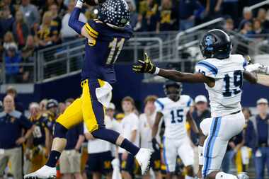 Highland Park's Whit Winfield (11) intercepts a ball intended for Shadow Creek's Carlton...