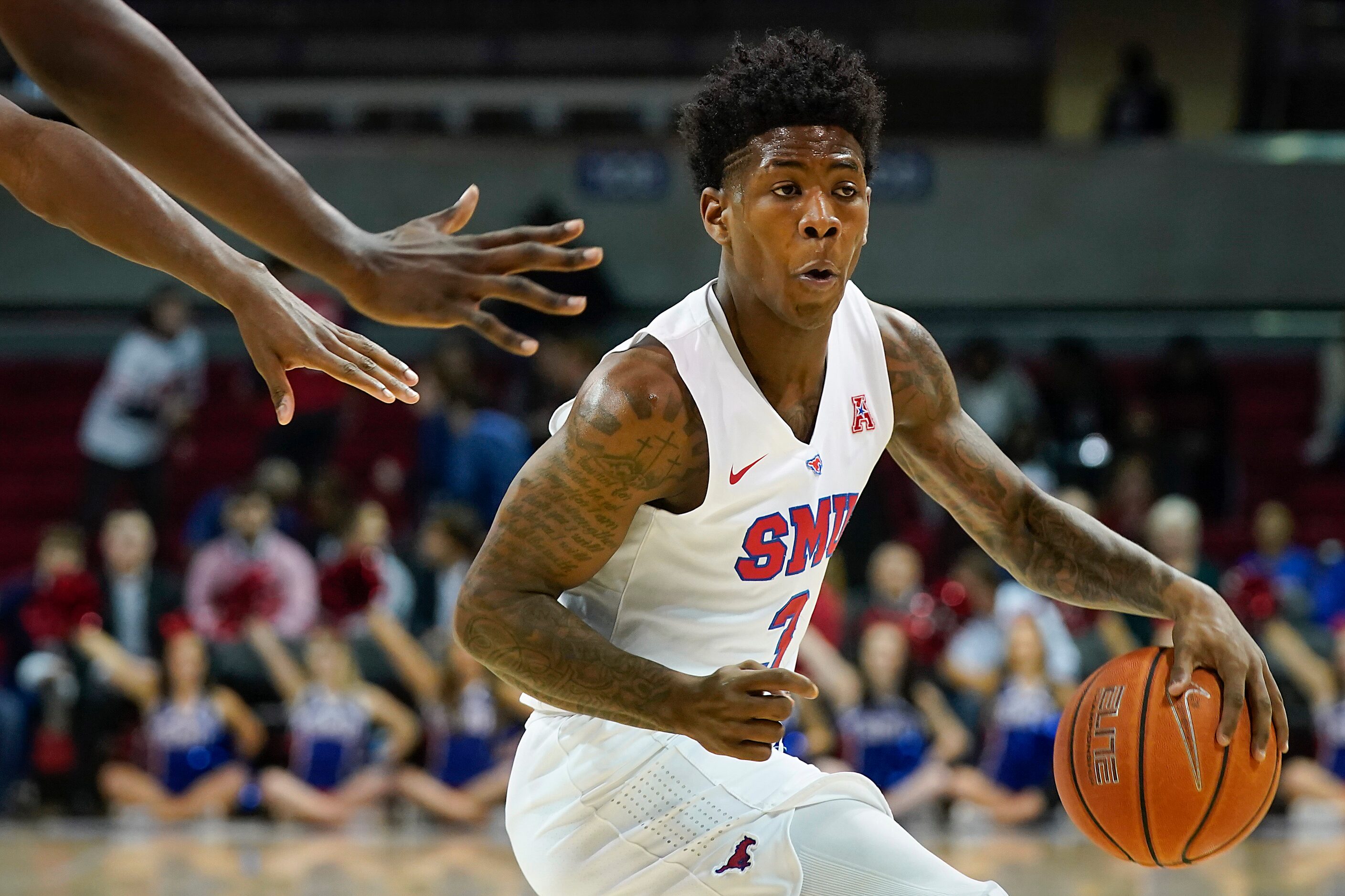 SMU guard Kendric Davis brings the ball up the floor during the first half of an NCAA...