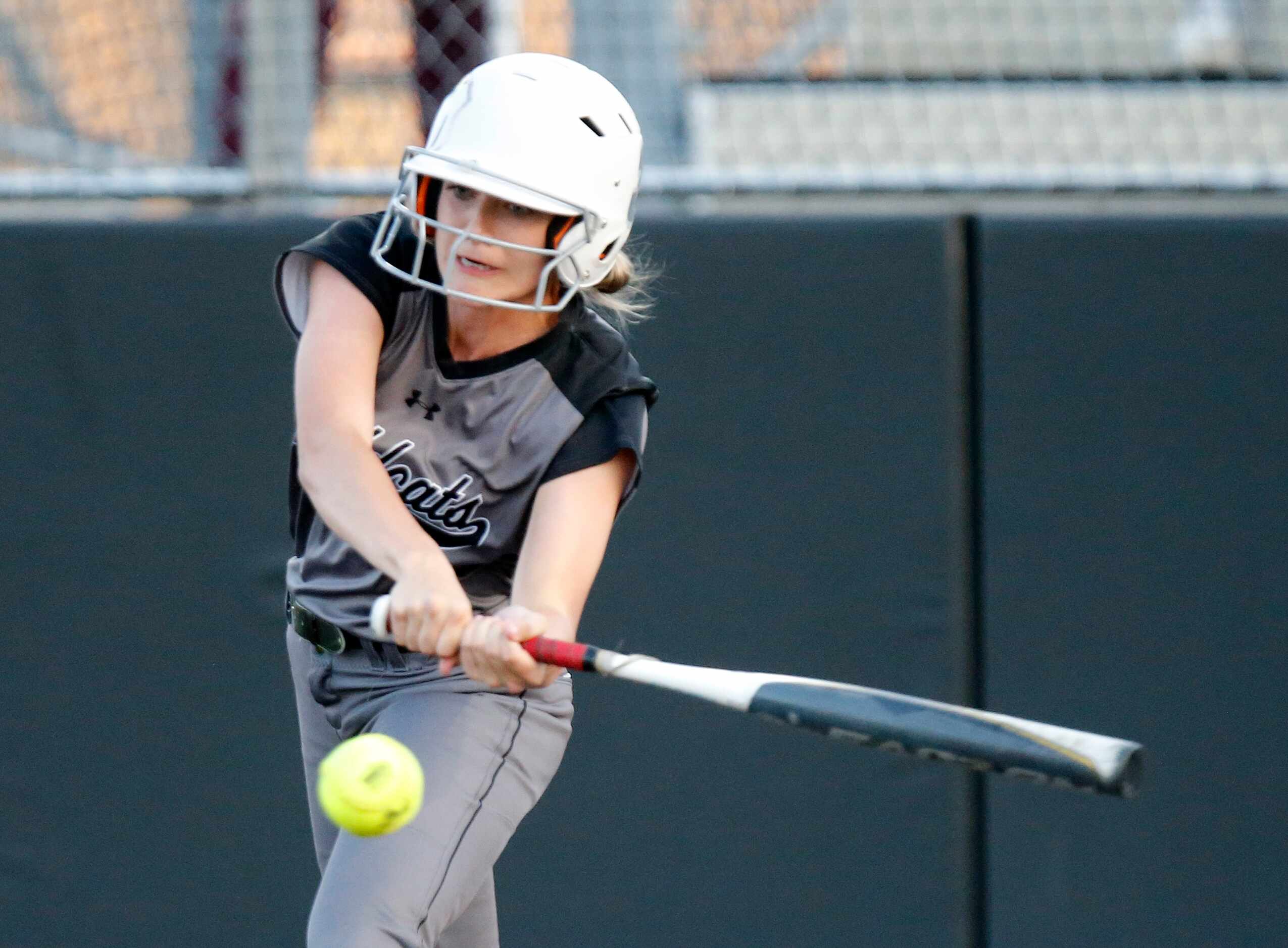 Denton Guyer High School outfielder Abby Holder (3) takes a swing in the first inning as...