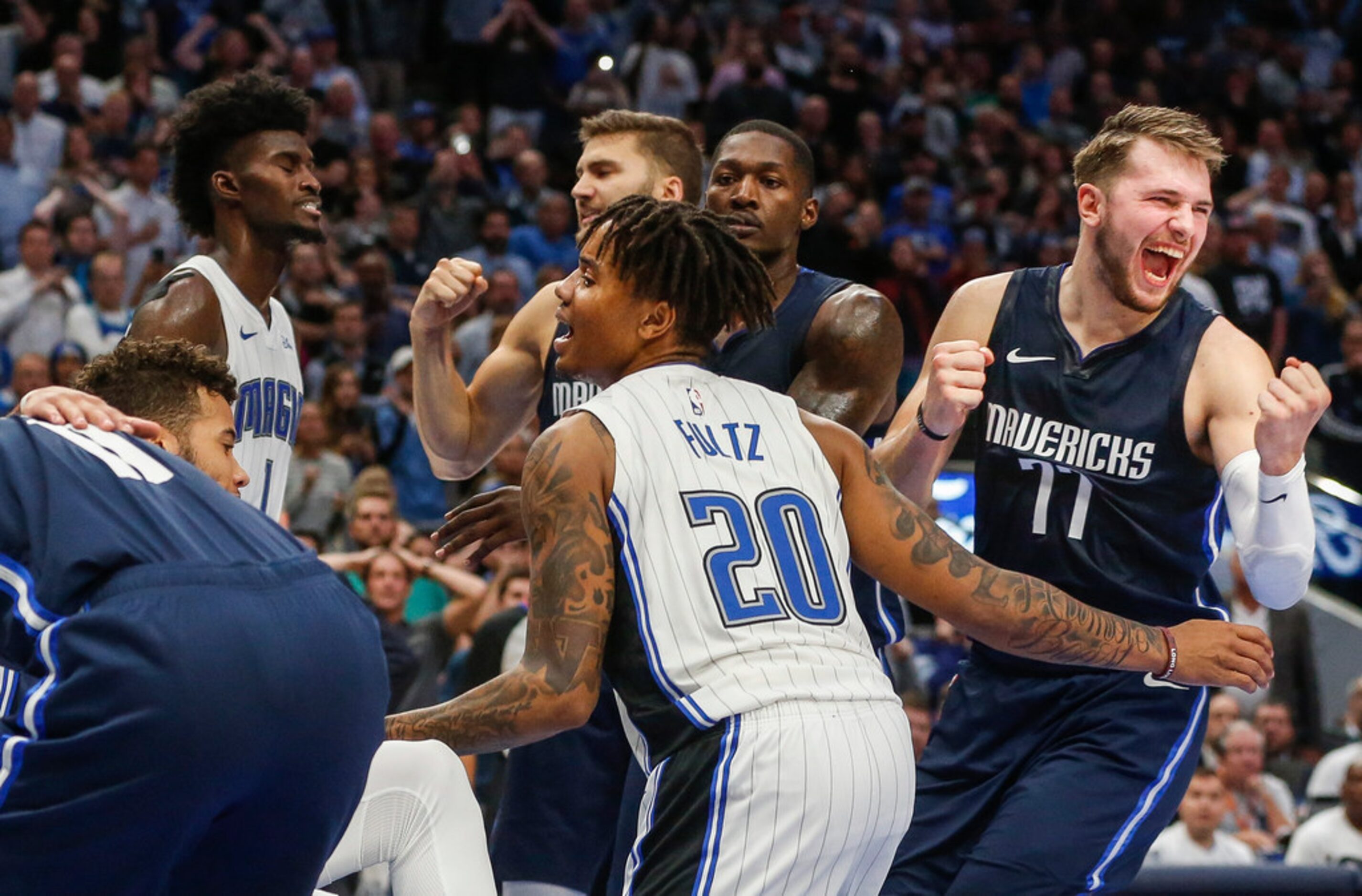 Dallas Mavericks guard Luka Doncic (77) celebrates a win over the Orlando Magic on...