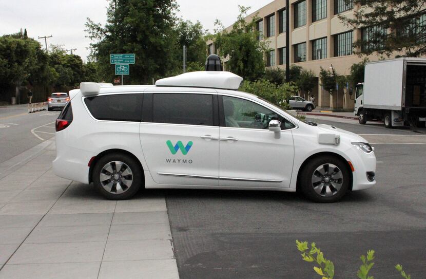 In this 2019 file photo, a Waymo self-driving car pulls into a parking lot at the...