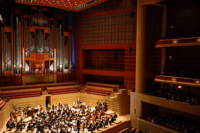 Organist Cameron Carpenter performs with the Dallas Symphony Orchestra during a concert on...