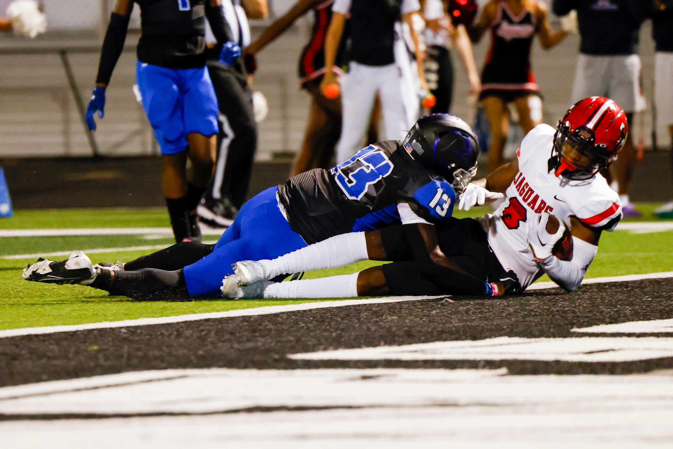 Mesquite Horn’s wide reciever Justin Underwood (8) falls into the end zone for a touchdown...