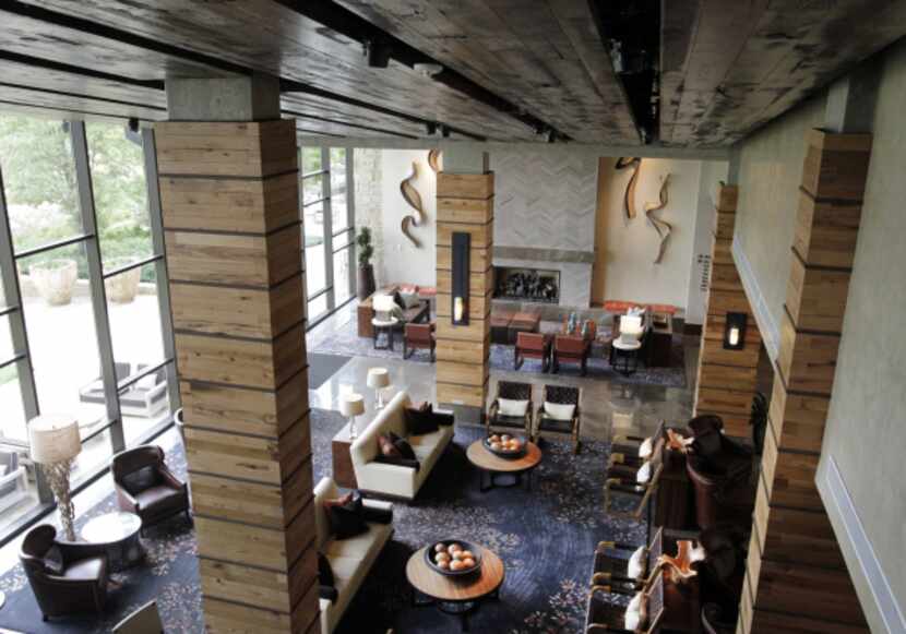 Ranch-style decor marks the main lobby at the campus. Large windows offer a view of rolling...