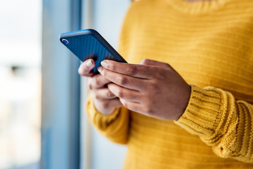 Woman holding a cell phone