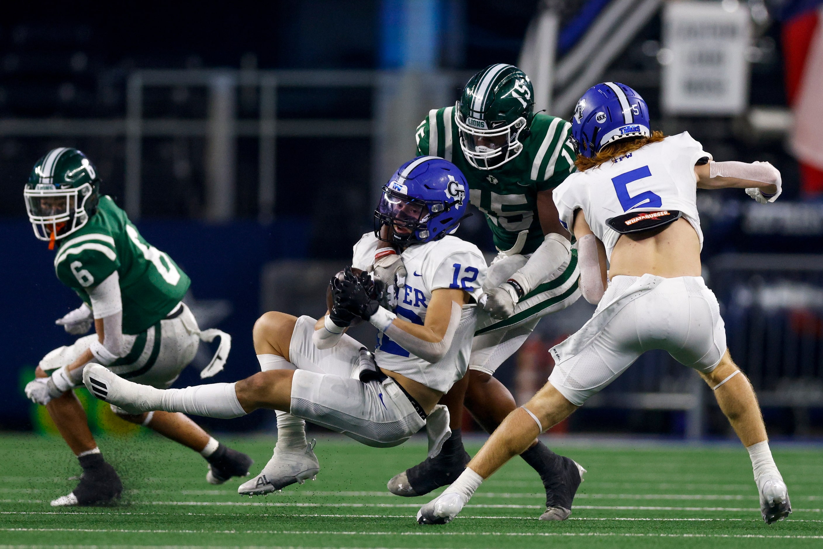 Franklin defensive back Bryson Washington (15) tackles Gunter running back Ivy Hellman (12)...