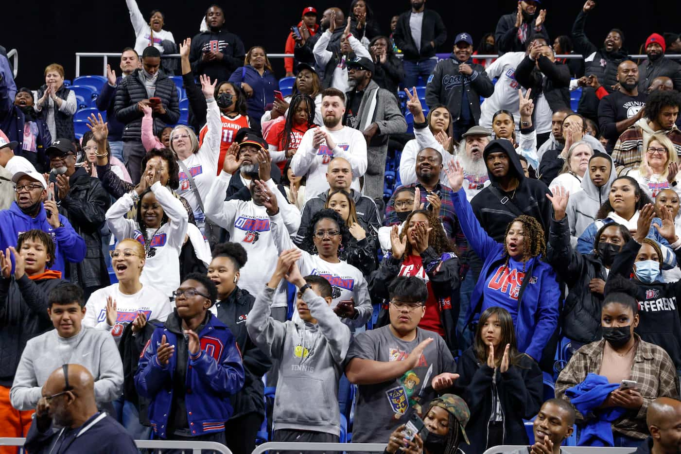 Duncanville fans celebrate after a Class 6A state semifinal game at the Alamodome in San...