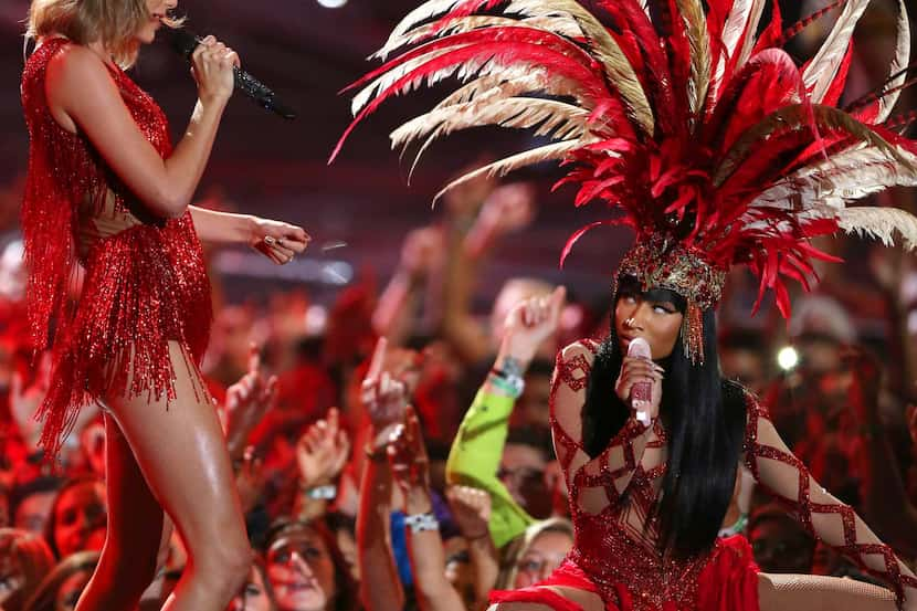 Taylor Swift, left, and Nicki Minaj perform at the MTV Video Music Awards at the Microsoft...