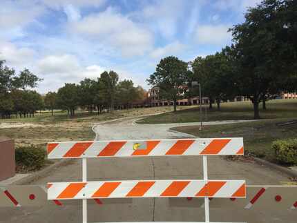 A barricade is in the long driveway to what was the main entrance of J.C. Penney's...