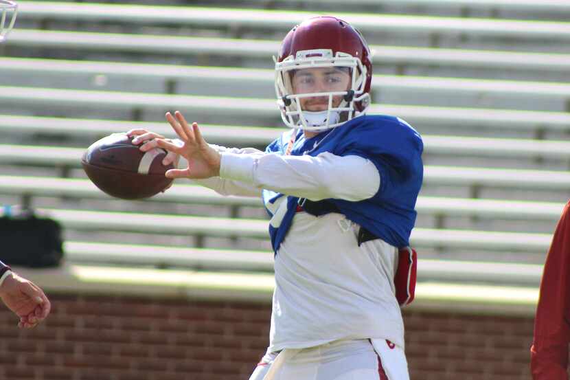 Oklahoma senior quarterback goes through drills during an open practice on March 8, 2016 in...
