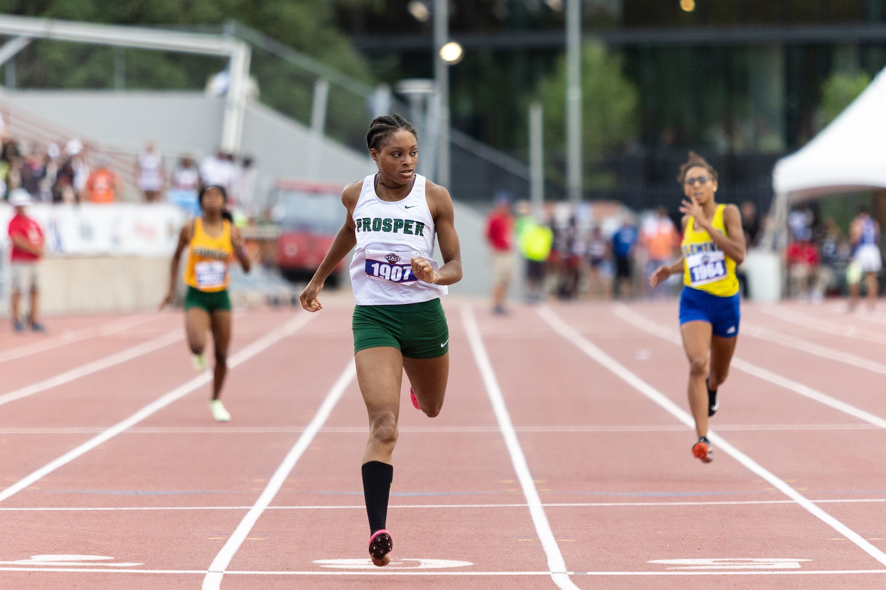 Lauren Lewis of Prosper looks to the scoreboard for her time in the girls’ 400-meter dash at...