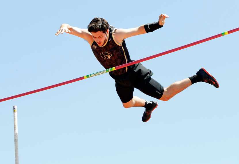 Pole vaulter Connor Gregston of Keller Fossil Ridge clears the bar at 15 feet-3 inches in...