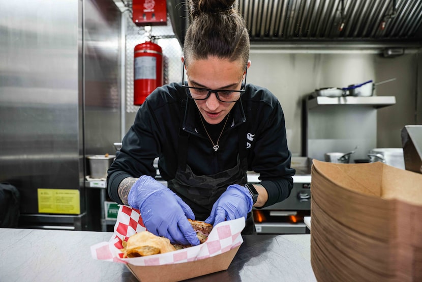 Chef Jordan Savell prepares El Cubano, her signature cuban sandwich with smoked pork...