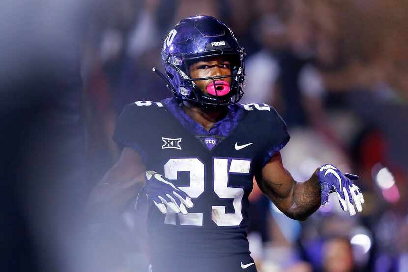 TCU receiver KaVontae Turpin (25) celebrates a touchdown catch against Texas Tech during the...