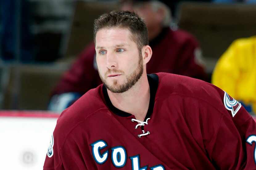 FILE - Newly acquired Colorado Avalanche defenseman Bryan Marchment takes to the ice during...