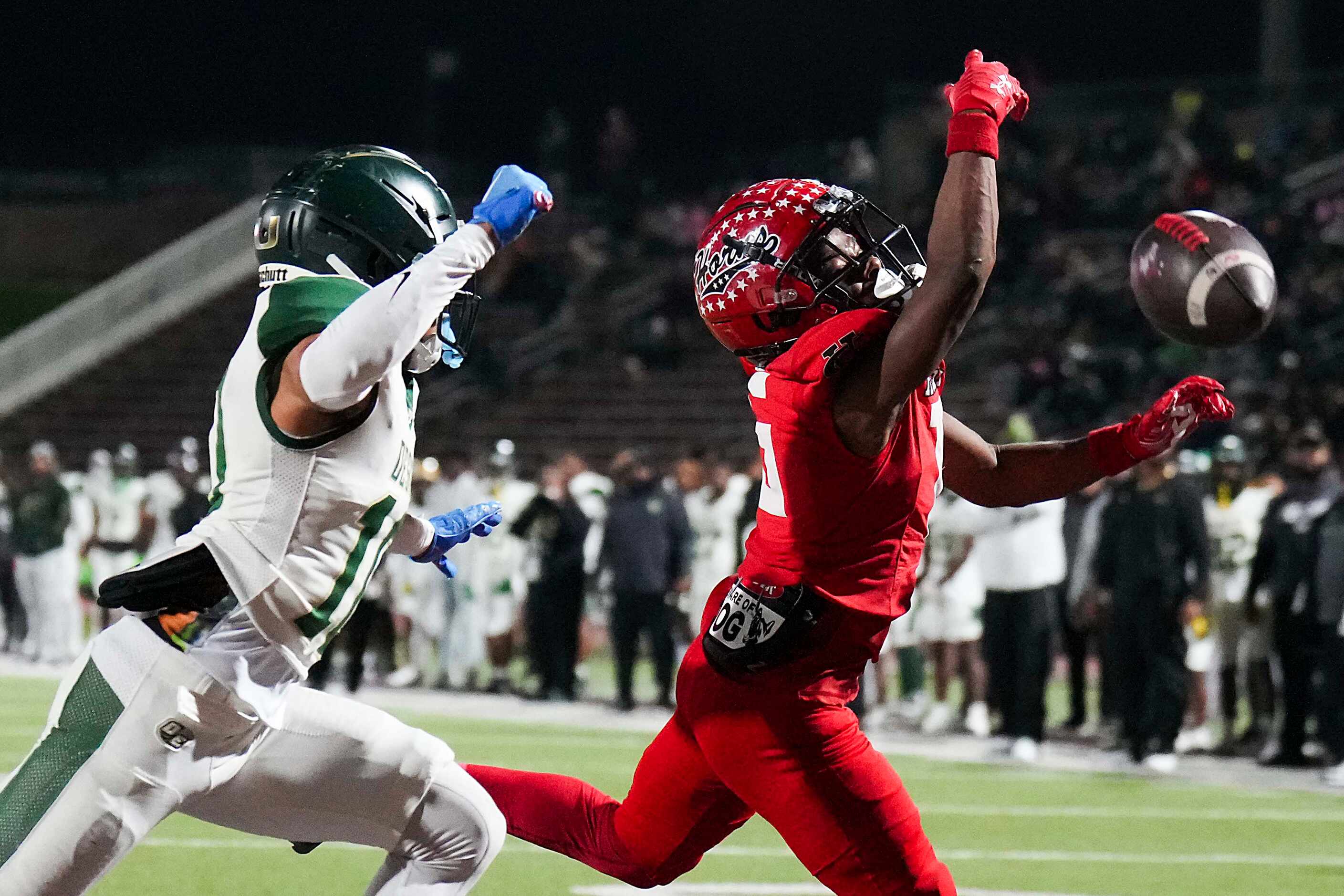 A pass goes out of reach for Cedar Hill wide receiver Kymeion Turner (15) as DeSoto...