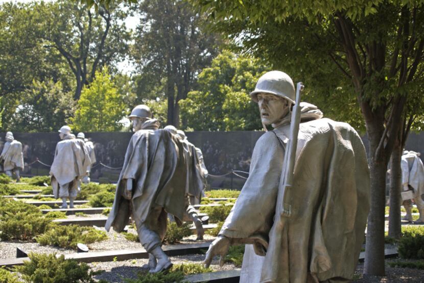 At the Korean War Veterans Memorial 19 stainless steel statues represent soldiers making...