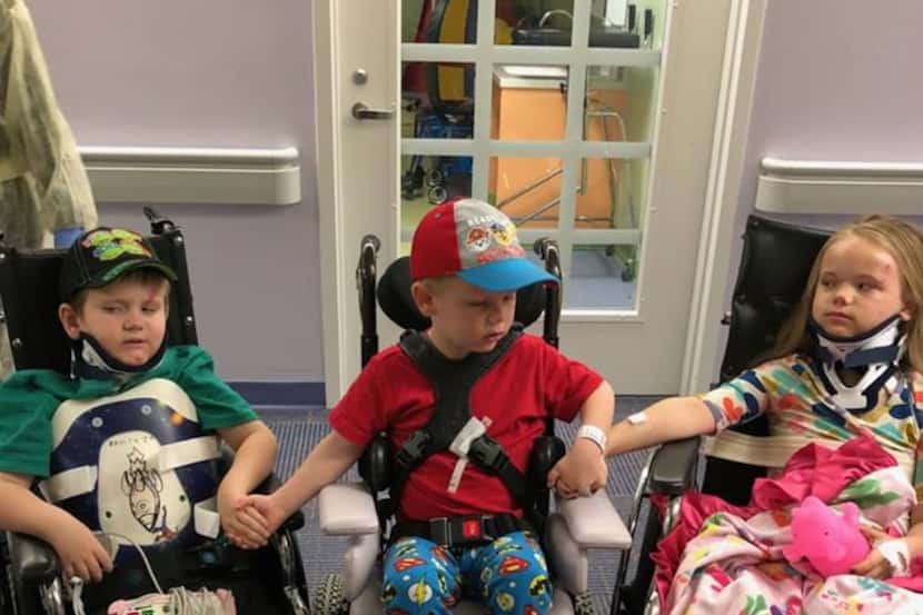 Zachary, 5, Wyatt, 4, and Angela, 8, were reunited at a Fort Worth hospital after surviving...