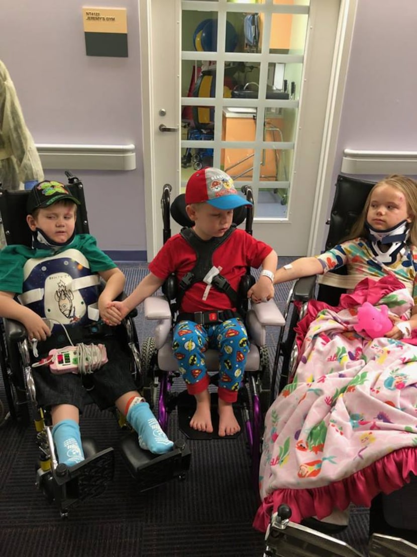 Zachary, 5, Wyatt, 4, and Angela, 8, were reunited at a Fort Worth hospital after surviving...