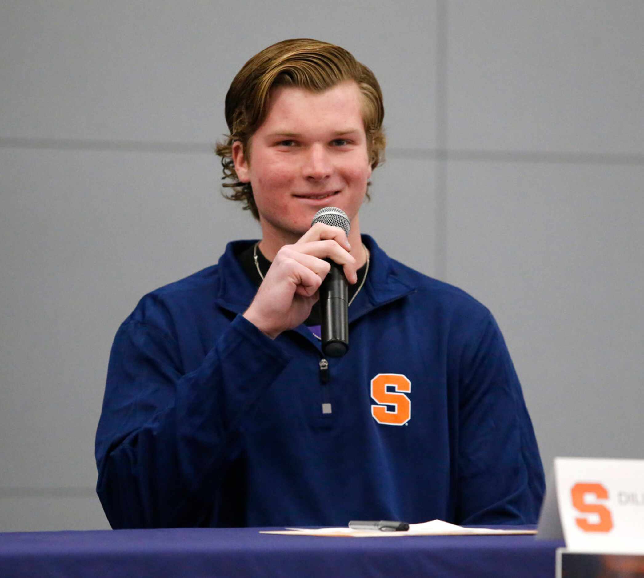 McKinney North quarterback Dillon Markiewicz speaks during the National Signing Day ceremony...