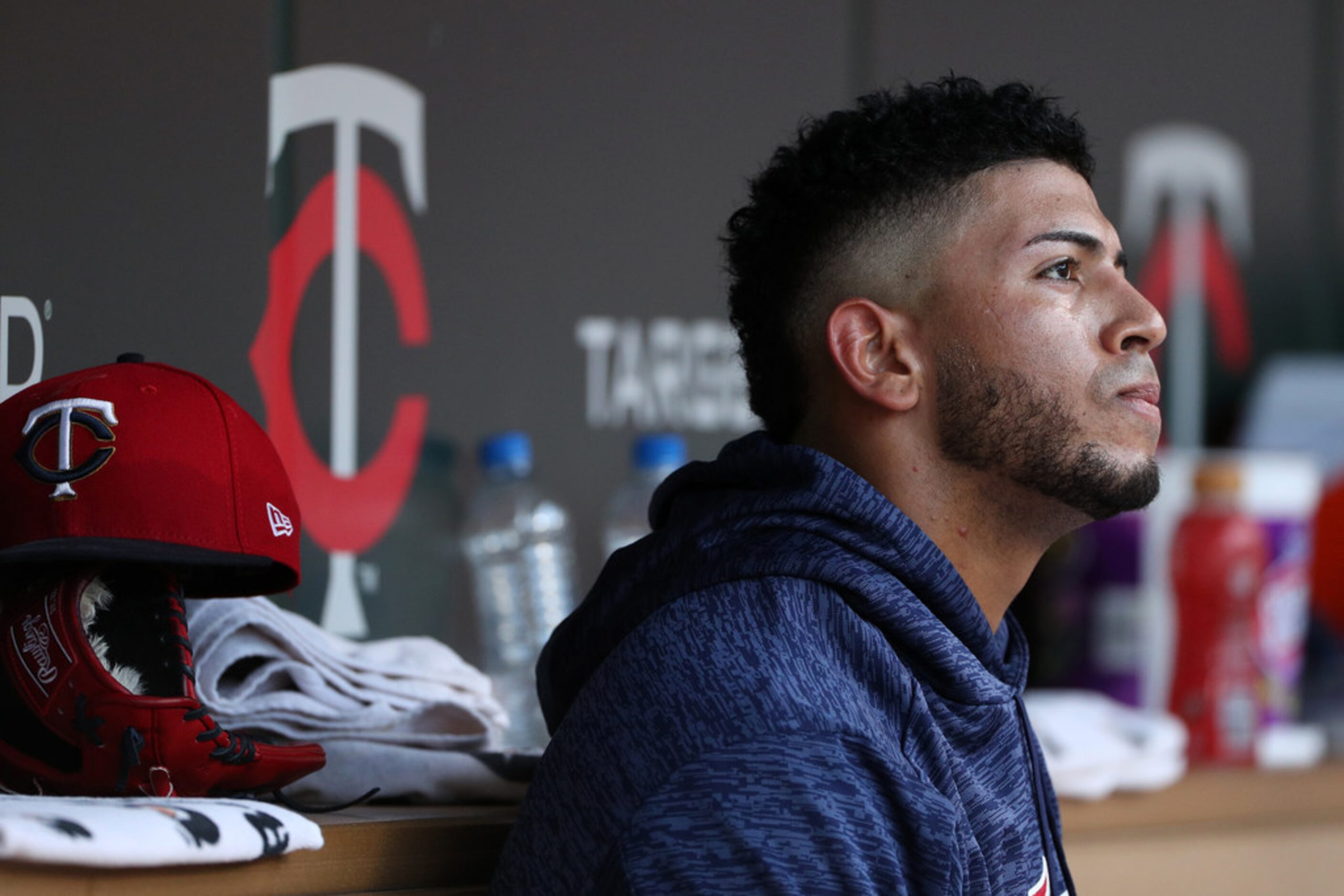 Minnesota Twins starting pitcher Fernando Romero watches from the dugout in the first inning...