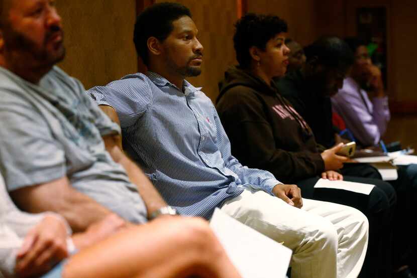 Aaris Powell waits during the You're Hired Job Fest at the Sheraton Dallas Hotel on Thursday.