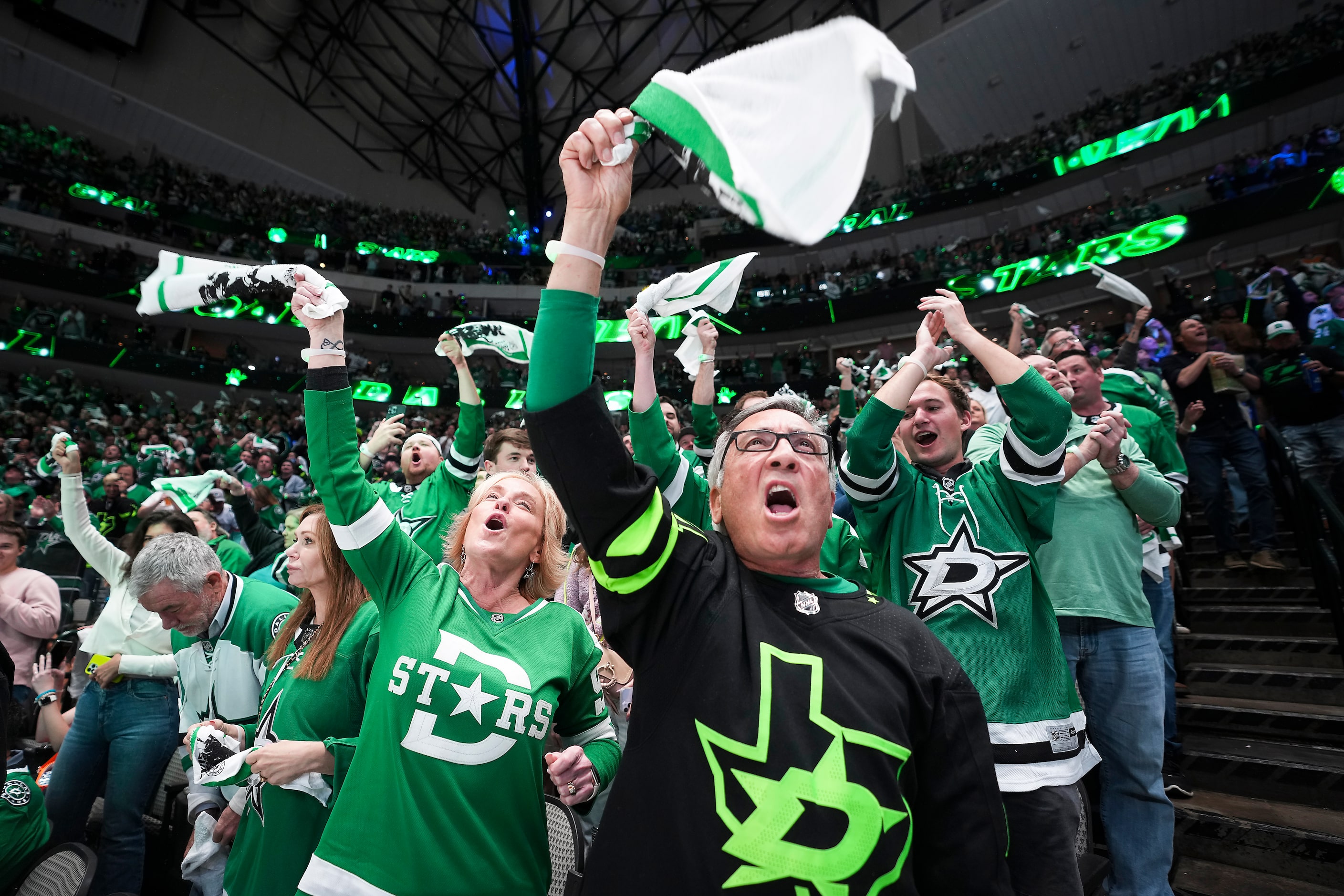 Dallas Stars fan Steve Jebbia cheers after a Stars goal during the second period in Game 1...