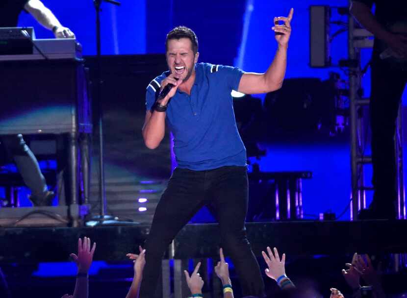 Luke Bryan performs at the 50th annual Academy of Country Music Awards at AT&T Stadium on...