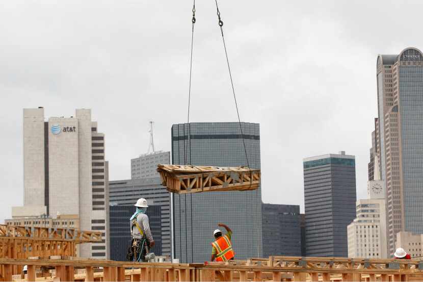 Construction on South Side Flats in Downtown Dallas is just one example of the new...