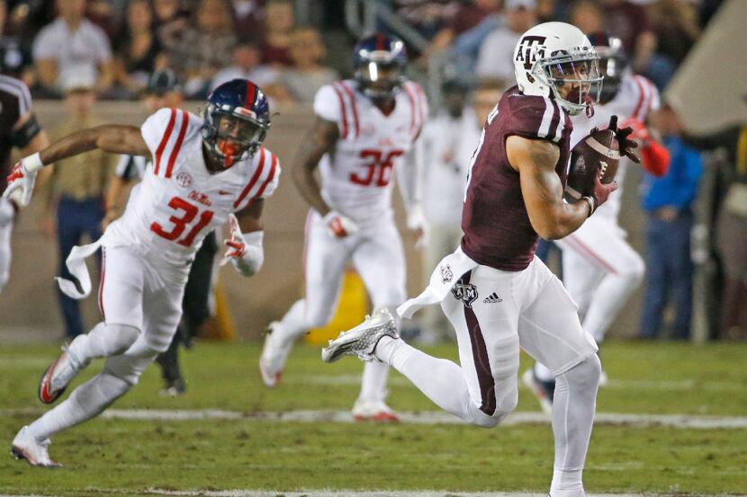 Texas A&M Aggies wide receiver Christian Kirk (3) is wide open as he catches a first quarter...