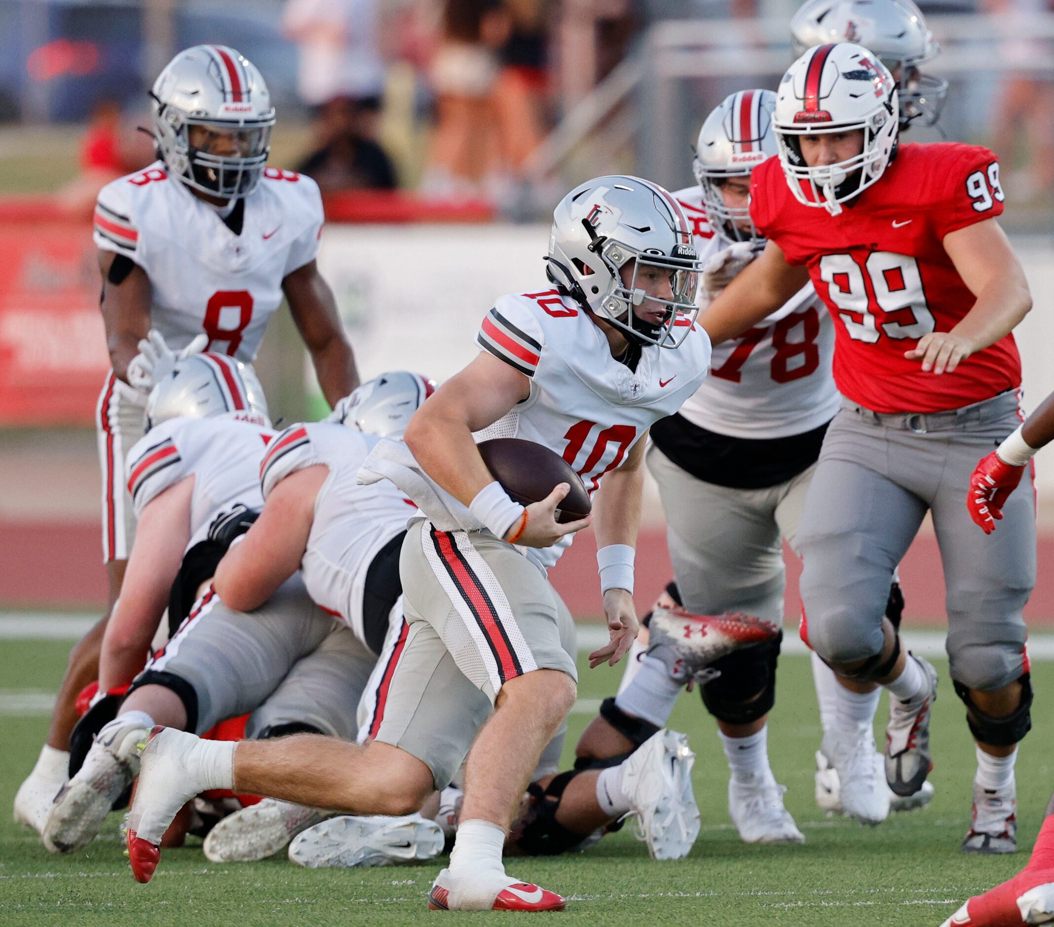 Lovejoy's quarterback Alexander Flanklin (10) carries the ball during the first half of a...