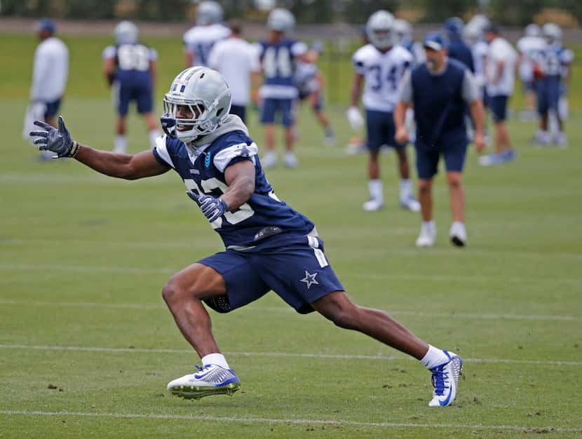 Dallas rookie cornerback Chidobe Awuzie (33) is pictured during drills at Cowboys rookie...