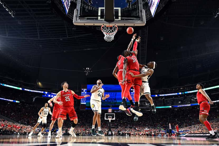 MINNEAPOLIS, MINNESOTA - APRIL 06: Cassius Winston #5 of the Michigan State Spartans drives...