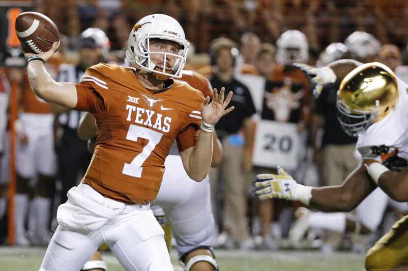 Texas quarterback Shane Buechele (7)throws a pass in the fourth quarter during the Notre...
