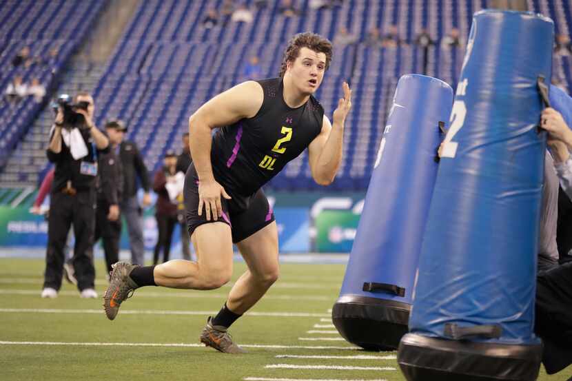 Florida defensive lineman Taven Bryan runs a drill at the NFL football scouting combine in...