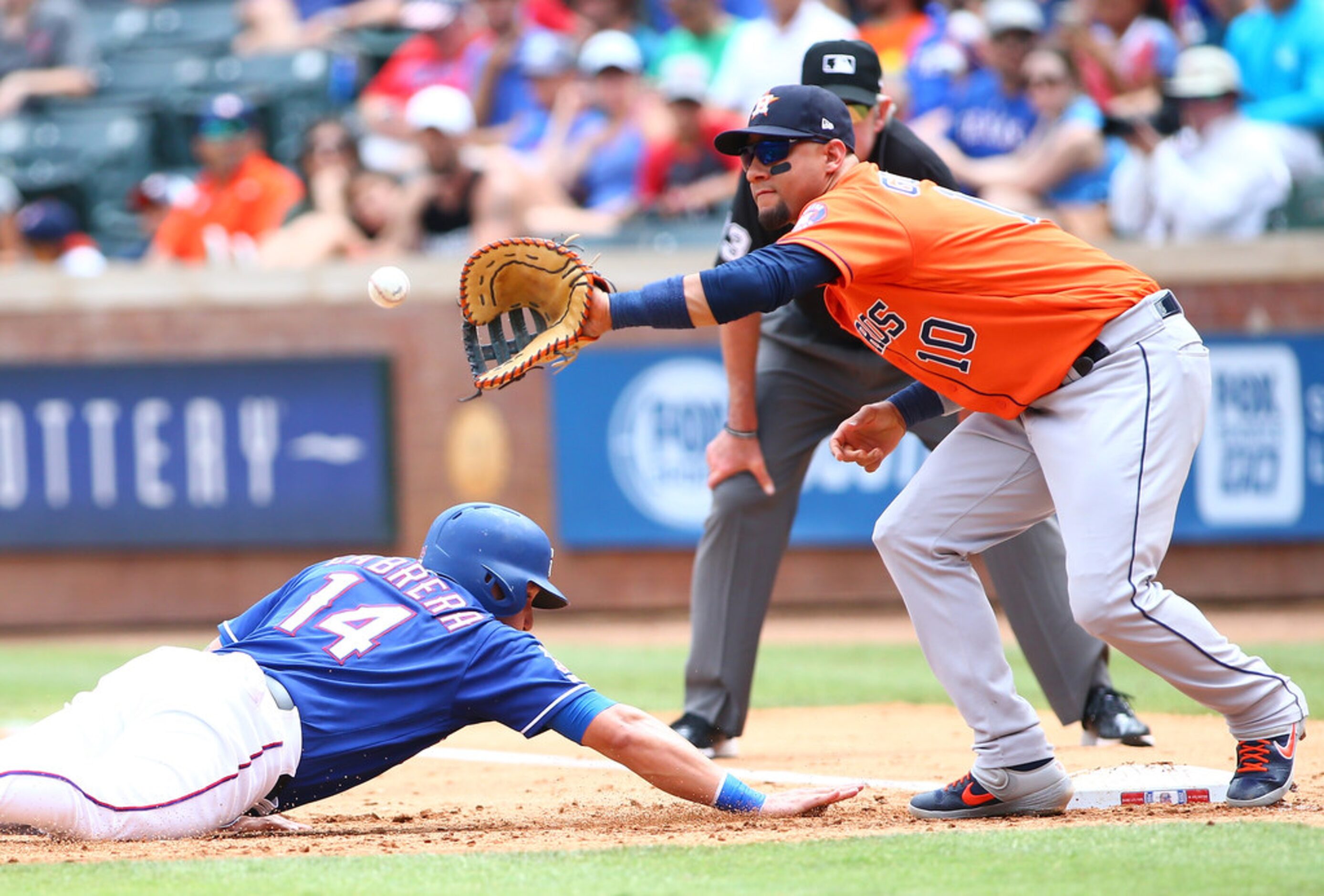 ARLINGTON, TX - JULY 14: Yuli Gurriel #10 of the Houston Astros misses the tag on Asdrubal...