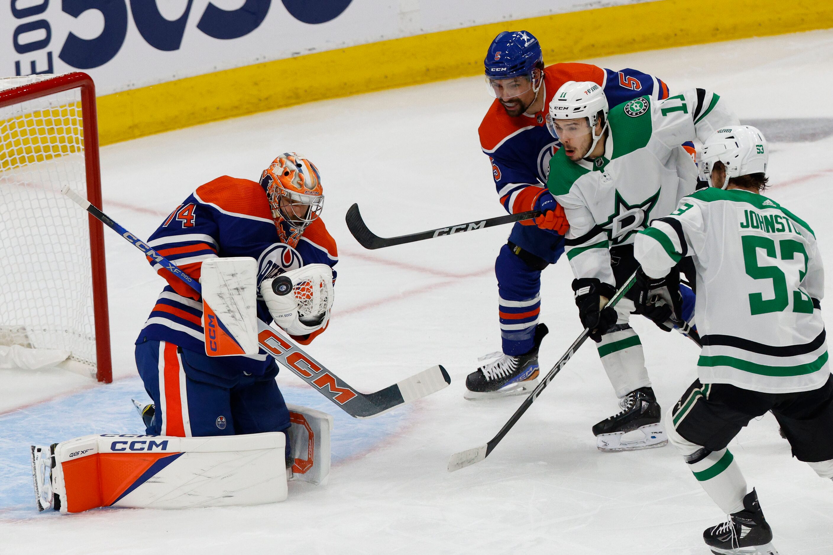 Edmonton Oilers goaltender Stuart Skinner (74) makes a save against Dallas Stars center...