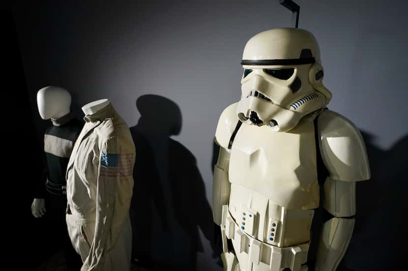 FILE - An imperial Stormtrooper costume, right, from the 1977 film "Star Wars, Episode IV, A...