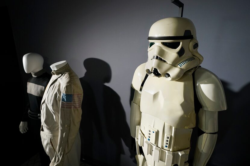 FILE - An imperial Stormtrooper costume, right, from the 1977 film "Star Wars, Episode IV, A...