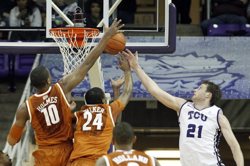 Feb 4, 2014; Fort Worth, TX, USA; TCU Horned Frogs guard Hudson Price (21) goes for a...