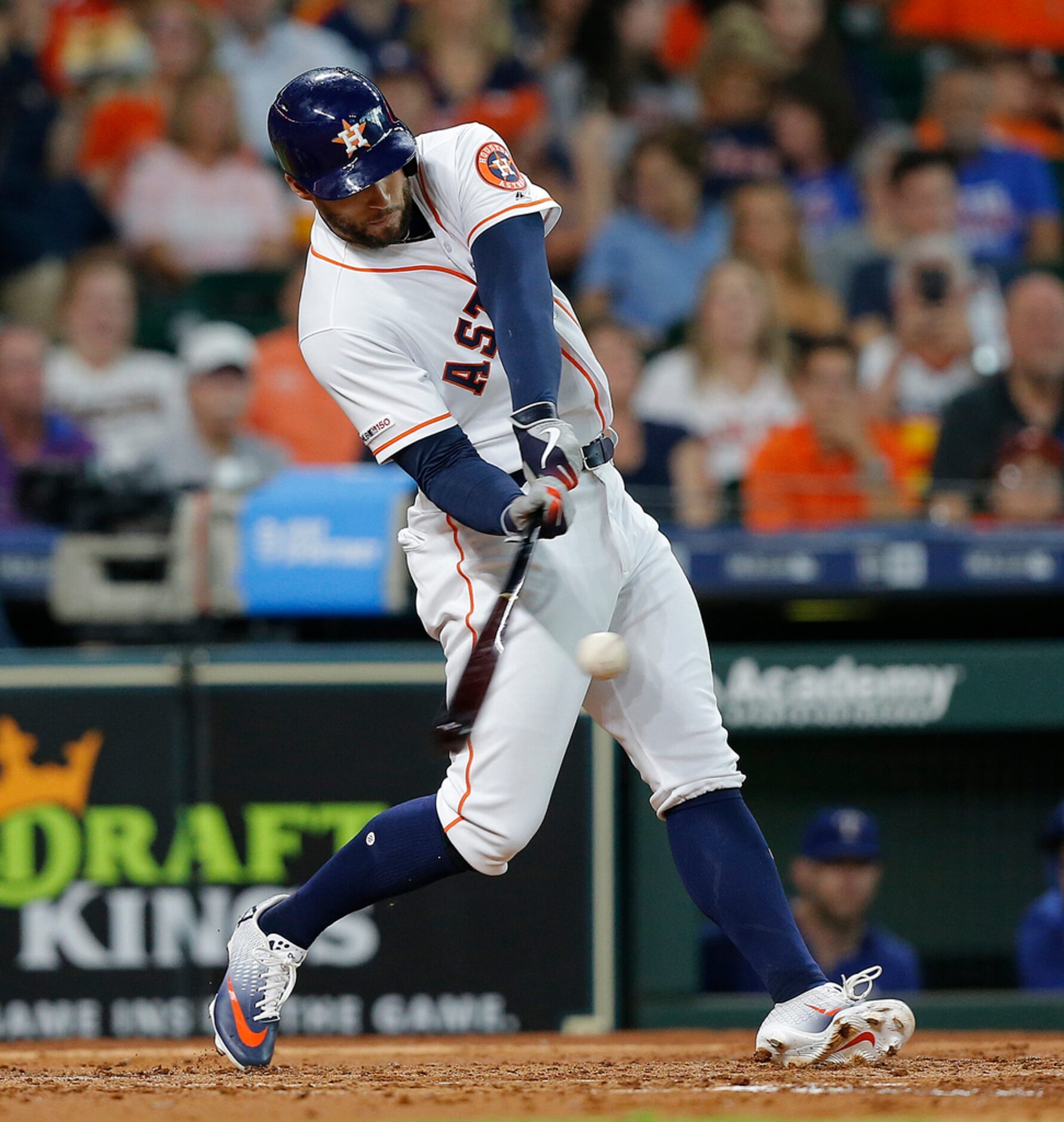 HOUSTON, TEXAS - JULY 20: George Springer #4 of the Houston Astros hits a RBI double in the...