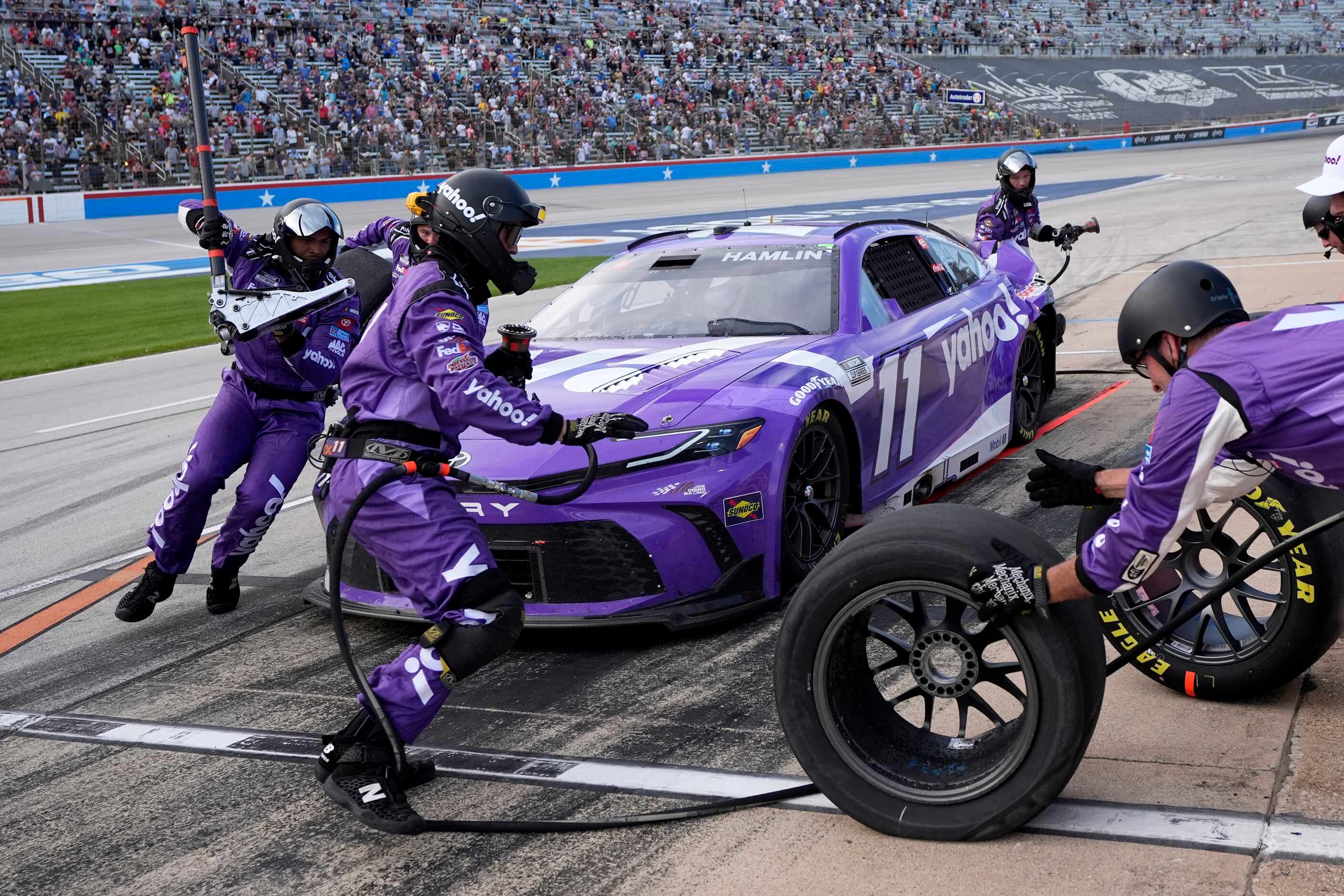 Denny Hamlin pits late after crashing in a NASCAR Cup Series auto race at Texas Motor...
