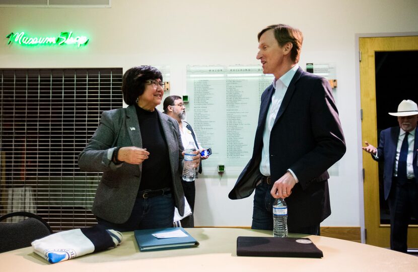 Gubernatorial candidates Lupe Valdez and Andrew White greet each other before a Democratic...