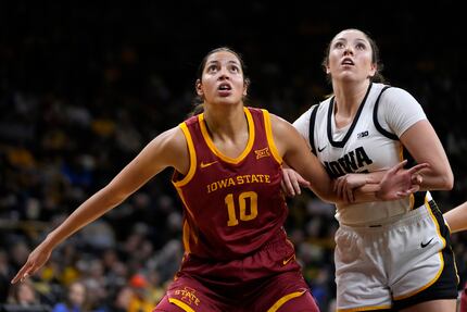 Iowa State center Stephanie Soares (10) eyes a rebound ahead of Iowa forward McKenna...