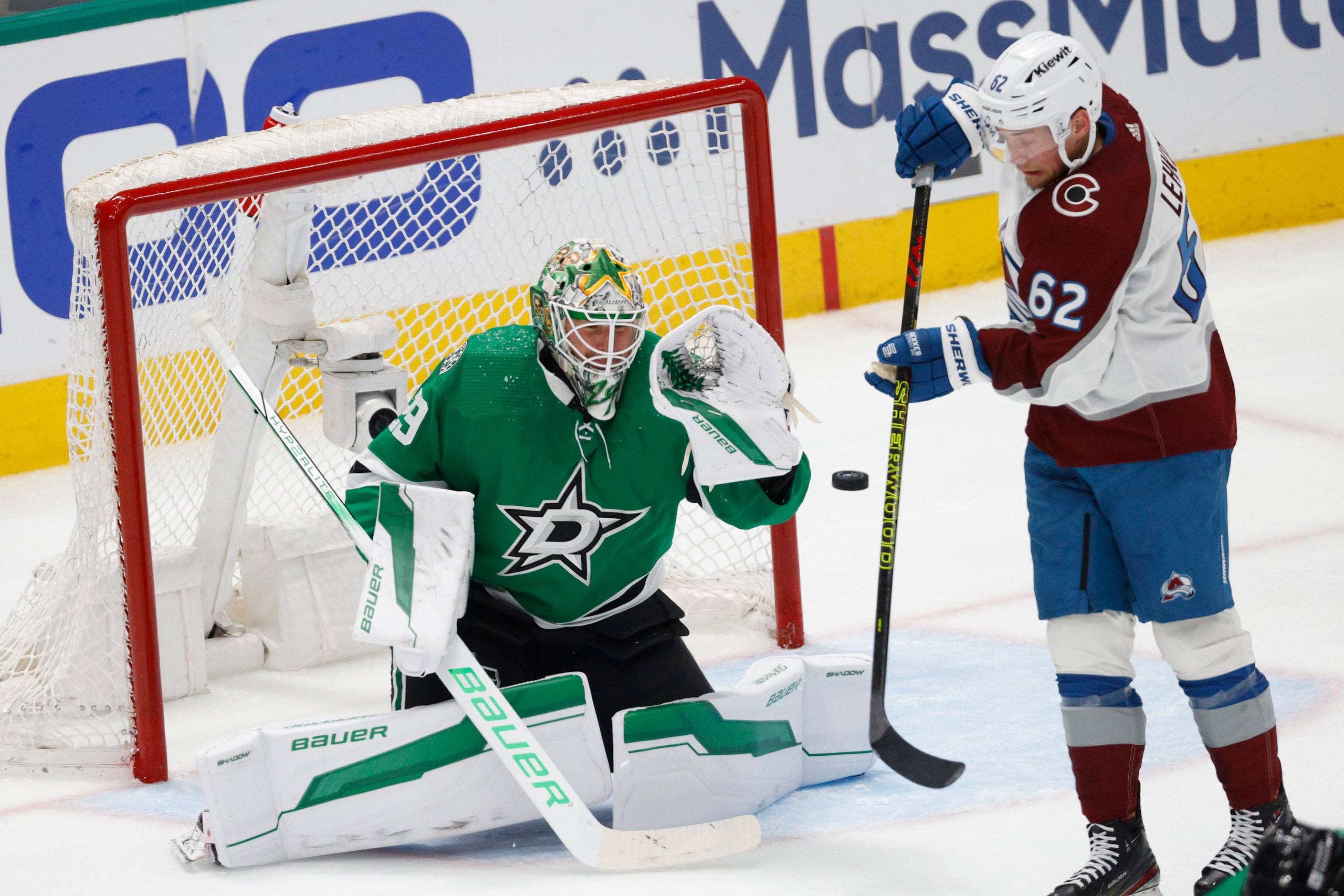 Dallas Stars goaltender Jake Oettinger (29) makes a save against Colorado Avalanche left...