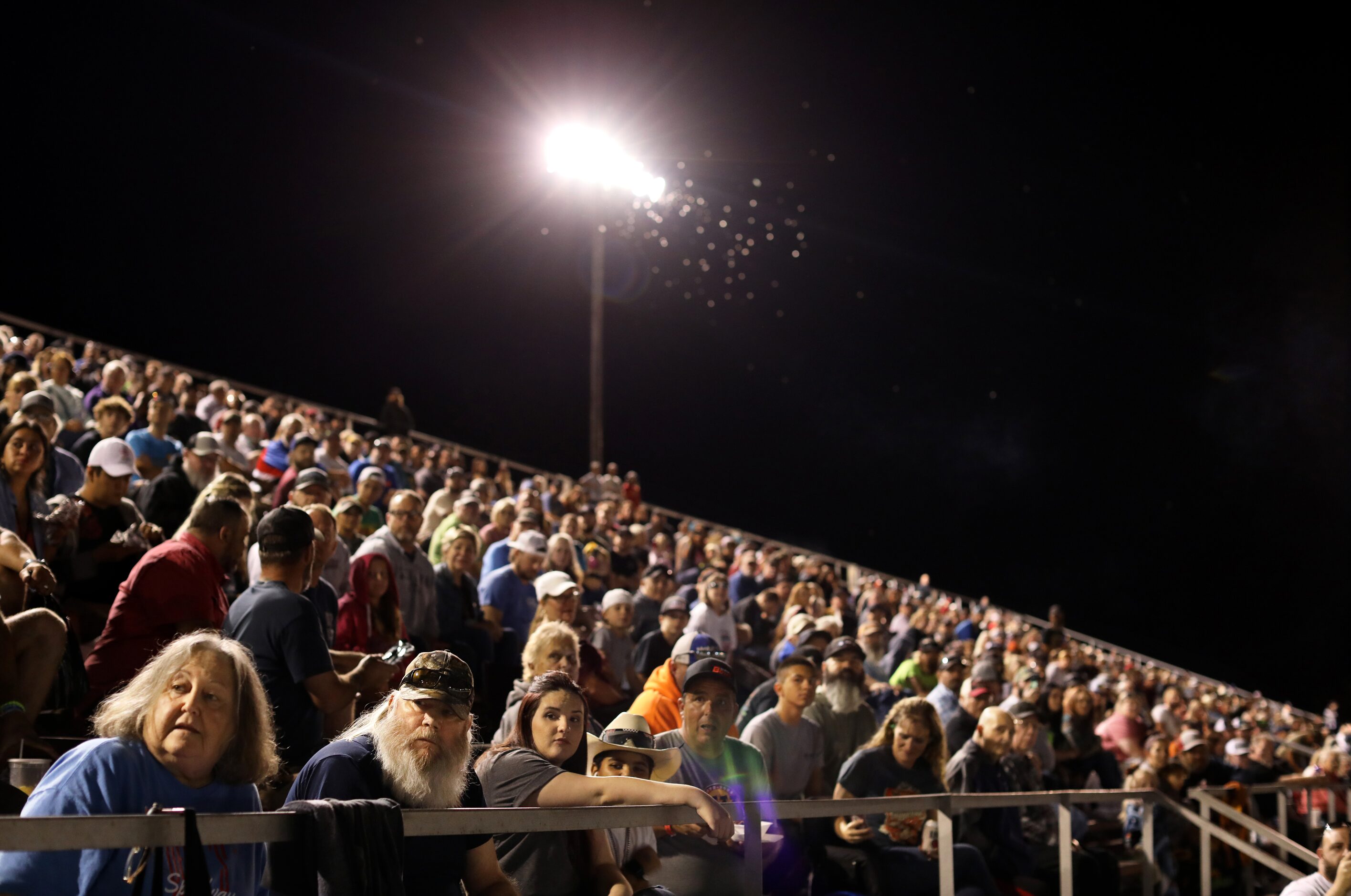 Fans watch a race Friday night at Devil's Bowl Speedway. (Jason Janik/Special Contributor)