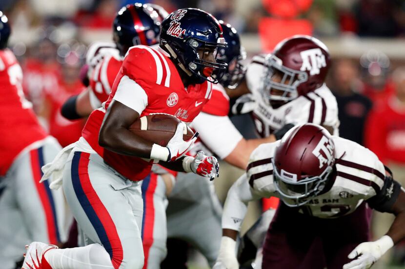 Mississippi running back D'Vaughn Pennamon (28) rushes against Texas A&M during the first...