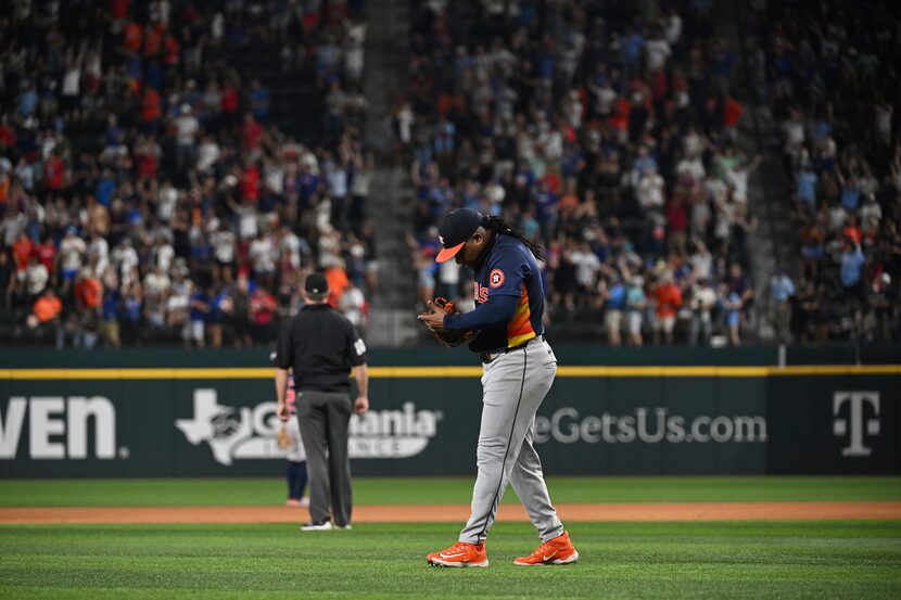 Houston Astros Framber Valdez lowers his head after giving up a two run home run to Corey...